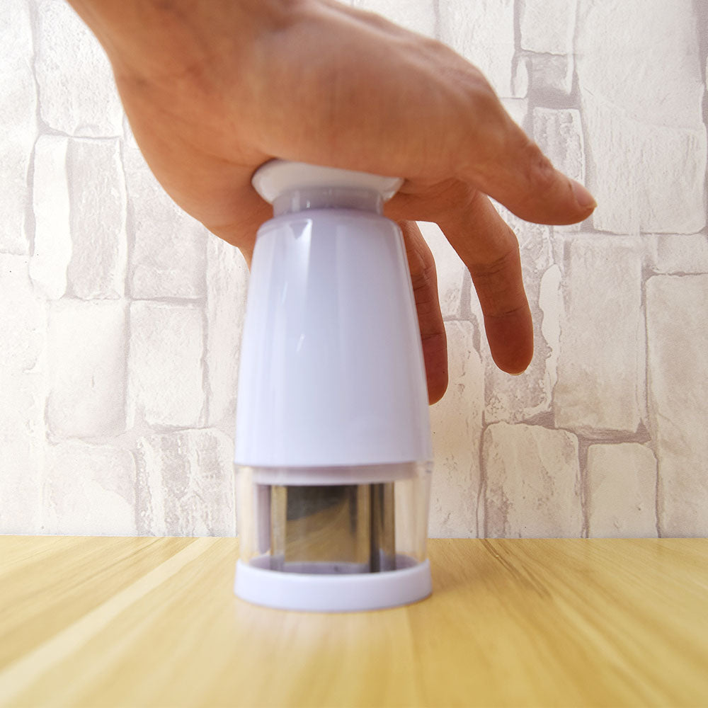 Hand-pressed semi-automatic garlic cutter